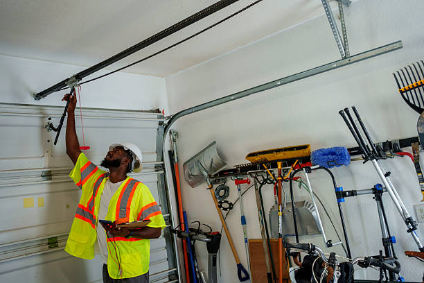 Professional Garage Door Panel Replacement technician working in Titusville, PA